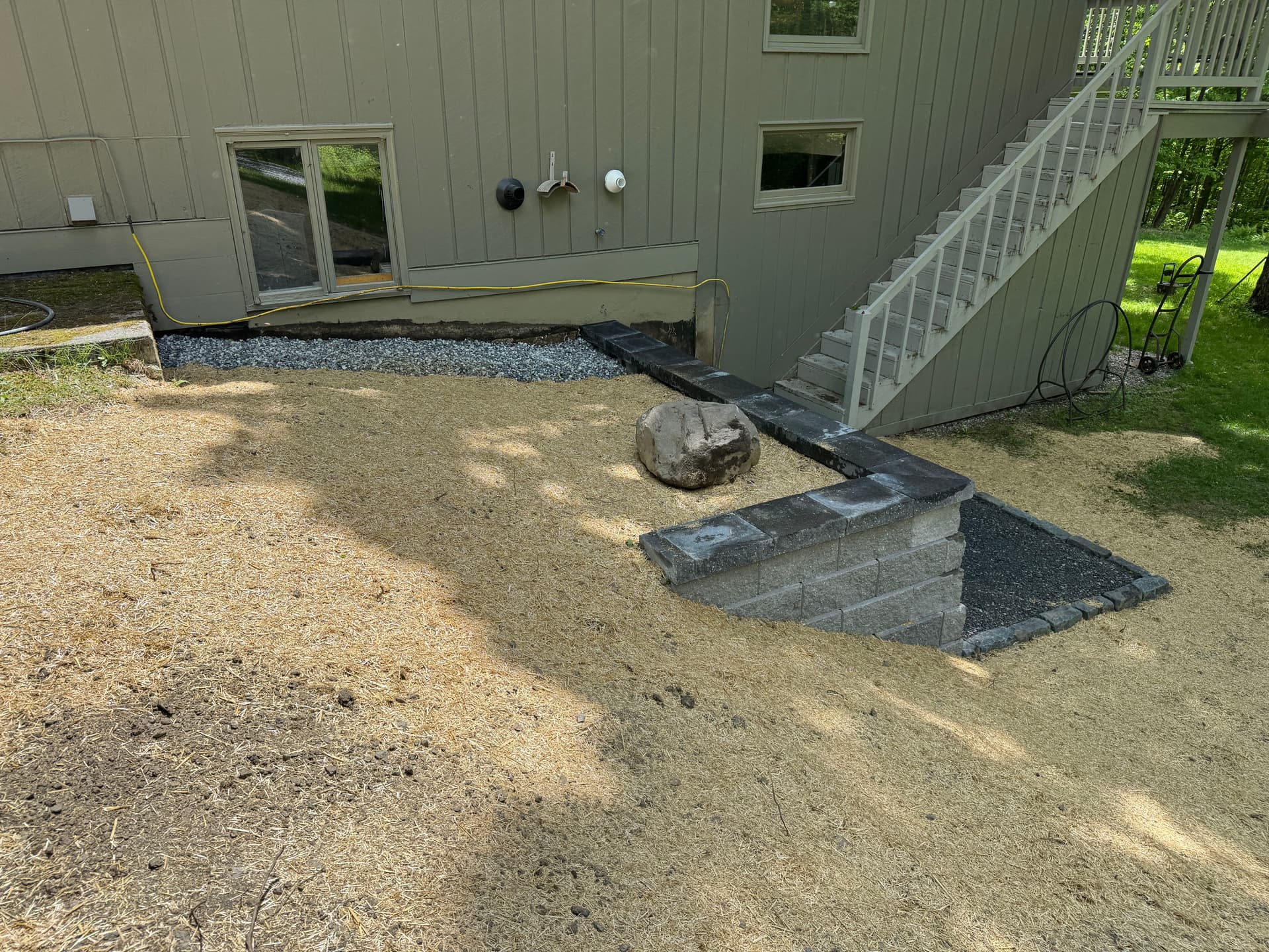 Gallery photos for Failing Wood Retaining Wall Replaced With Engineered Block and French Drain: Image #1