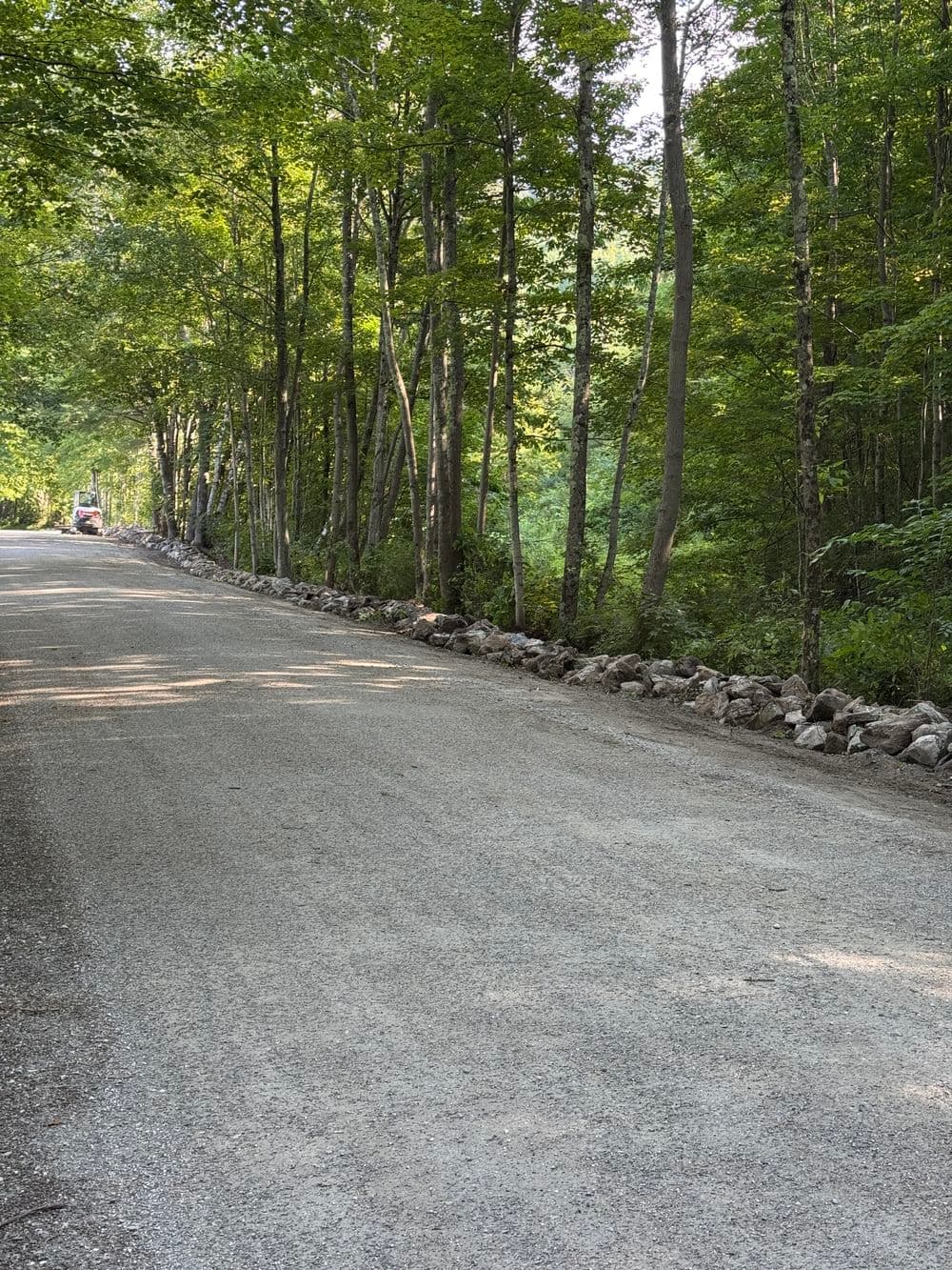 Gallery photos for Revitalized Rock Wall Along a Community Road in Dorset: Image #3